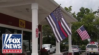 Restaurant owner fined for flying American flag