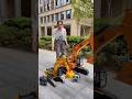 Big CAT excavator truck assembling clay