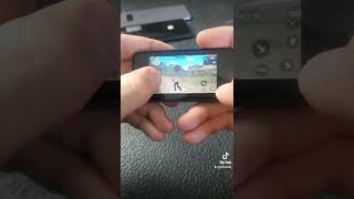 playing FREE FIRE on worlds smallest smartphone #shorts