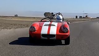 Vintage Elva Courier racing around Buttonwillow