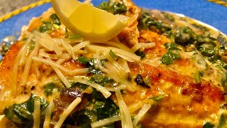 Pan Seared Salmon Florentine over pasta  with mixed salad