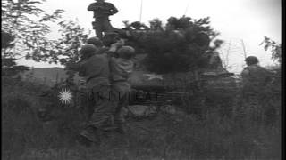 Crew of US 70th Tank Battalion, Company C cleans 76mm tank gun in Korea during Ko...HD Stock Footage