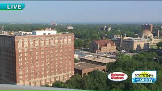 Kenny checks out the view from One University Circle luxury apartments