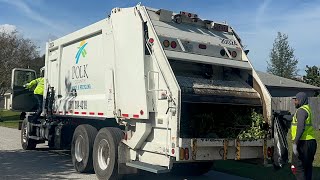 2 White Conventional Rear Loader Garbage Trucks in Polk County