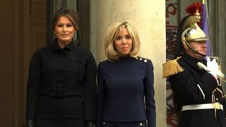 French first lady greets Melania Trump at the Elysee