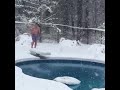 Brave, or nuts? Swimming in the April snowstorm