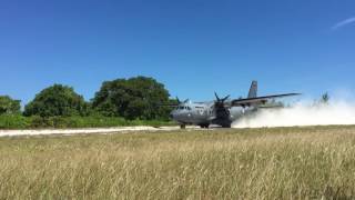 CASA C-295 landing on beach sand strip