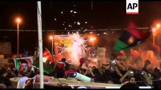 Rebels celebrate in Benghazi as their fighters take control of capital