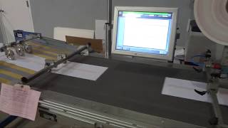 MBO Specialty System-applying peel and stick tape to a card or sheet or other product