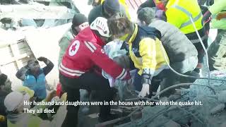 Woman pulled from quake rubble in Turkey