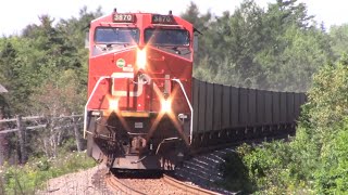 Two Gevos Lead Empty Gypsum Train CN 511 West Passing Enfield, NS at Track Speed