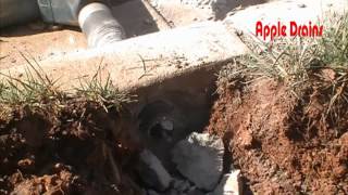 Drilling a Curb Hole for Sump Pump Discharge