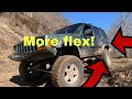 This is how to get the most flex out of an Jeep xj with leaf springs in the rear!