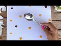 Paint flowers in an easy and fun way with a spoon