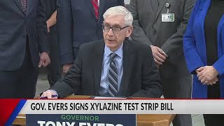 Governor Evers visits La Crosse, signs bill into law. Does it again in Appleton