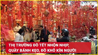 Thị trường đồ Tết nhộn nhịp, quầy bánh kẹo, đồ khô kín người | Báo Lao Động