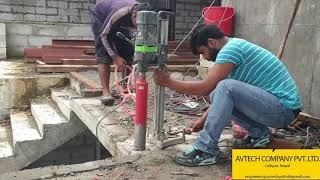 Drilling Holes Into a Concrete Slab By Diamond Core Cutting Machine