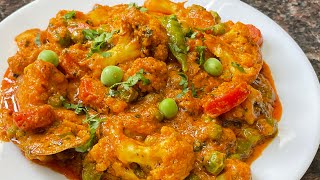 A unique, delicious vegetable made from cabbage, carrot and peas without onion and garlic. Gajar gobhi matar ki sabji, Jain vegetable.