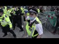 Batons out as police clash with anti-lockdown protesters in London