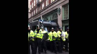 Riot police form a blue line outside Fortnum \u0026 Mason