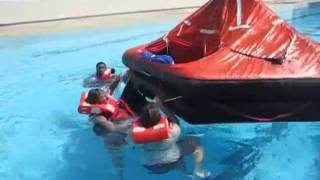 Righting an inflatable life raft.