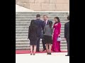 Xi and his wife walking down steps to welcome Vietnam's Lams in Beijing