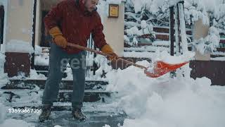 Man shoveling snow.