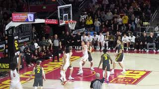 See the Tip Off of the USC/Iowa  Basketball Game and the First Basket by USC's #6 Wesley Yates III