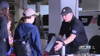 Officers' friends and family get an inside look at Erie Police Department open house