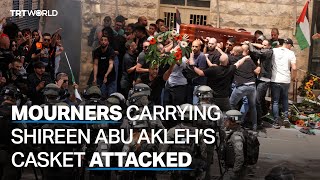 Israeli forces attack mourners carrying Shireen Abu Akleh’s casket