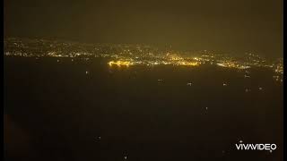 夜の山口上空から美しい街なみと…東京湾の夜景.着陸