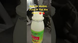 Drinking Addlife Herbal Juice @ The Airport