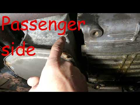 How do you check the transmission fluid in a Pontiac Grand Prix?