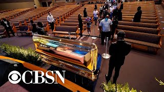Hundreds pay respects to George Floyd in Houston church