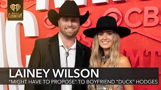 Why Lainey Wilson 'Might Have To Propose' To Boyfriend Devlin 'Duck' Hodges | Fast Facts