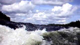 Waves in Tornios Matkakoski in finland seen from helmetcamera of kayaker