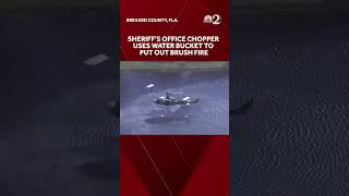 Brevard County Sheriff's Office works to put out brush fire with helicopter