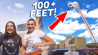 WE ASKED GIRLS TO JUMP FROM THIS CRANE!! (100+ FEET FLIPS)
