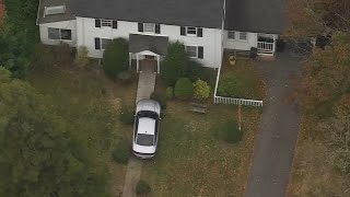 Woman arrested after son says caregiver stabbed his elderly mother, rammed her car into house