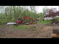 pulling a tulip stump with a kubota excavator