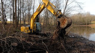 60 ACRES - grubbing pond trees and mulching field edges