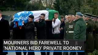 Mourners bid farewell to ‘national hero’ Private Rooney