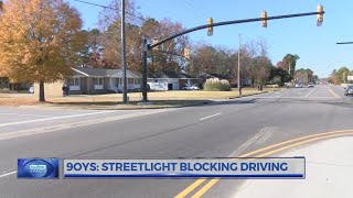 9OYS STREETLIGHT BLOCKING DRIVEWAY