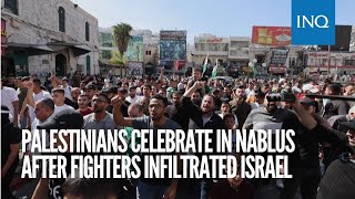 Palestinians celebrate in Nablus after fighters infiltrated Israel