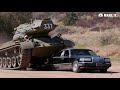 jay leno and arnold schwarzenegger crush a limo in a tank