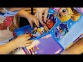 Little MIA opening book with toys