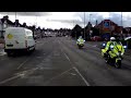 two wiltshire police motorcycles on a blue light run in swindon