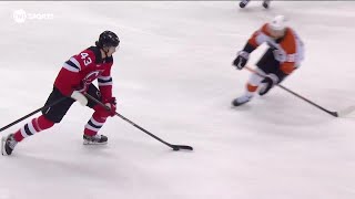 Luke Hughes scores a goal against the Philadelphia Flyers