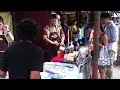 tea vendor in chatachuk market in bangkok thailand.