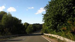 Driving through Ibiza, being overtaken by speeding motorbikes